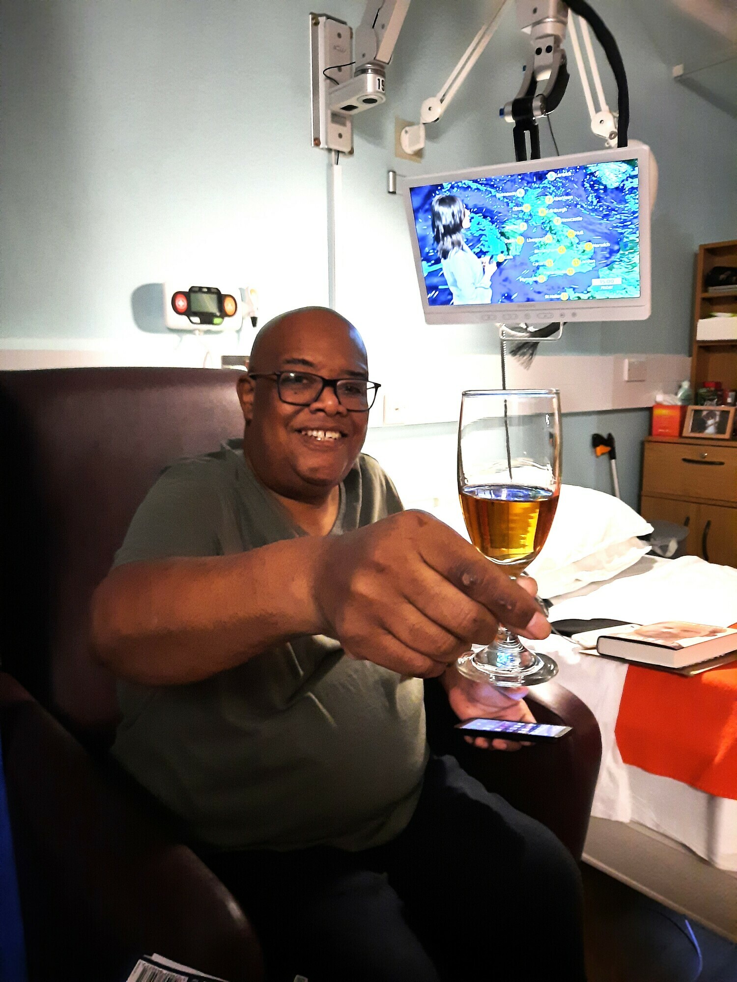 Karl enjoying a drink on the ward