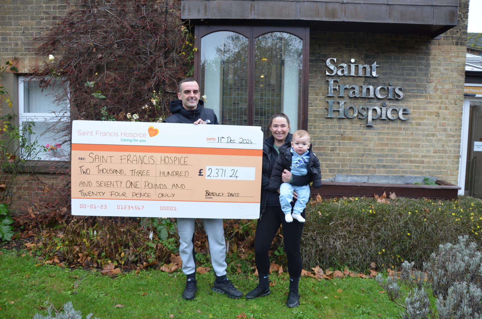 Bradley Davis with his partner Jessica Charlwood and their son Bradley